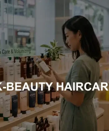 Woman in a green dress examining a K-beauty product in a bottle in a brightly lit boutique with wooden shelves and a window view.