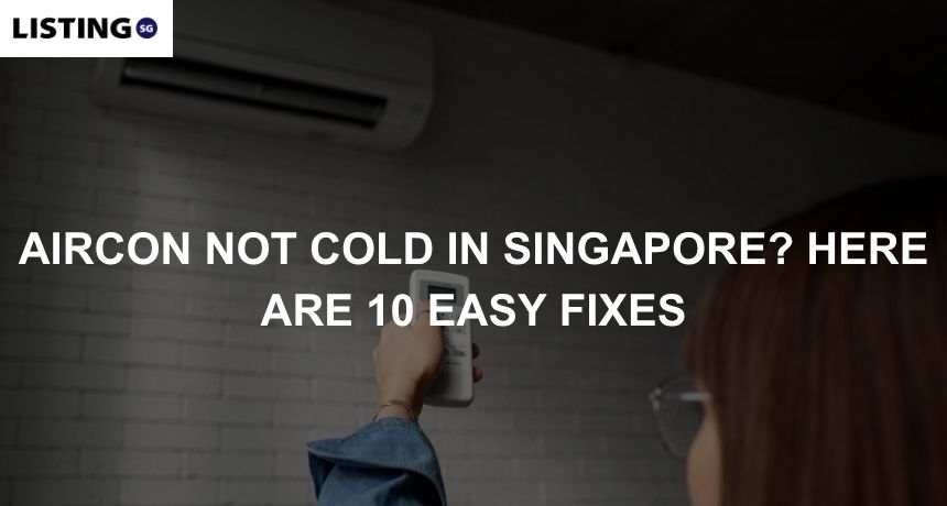 Photo of a woman adjusting the temperature on her aircon, because the aircon is not cold
